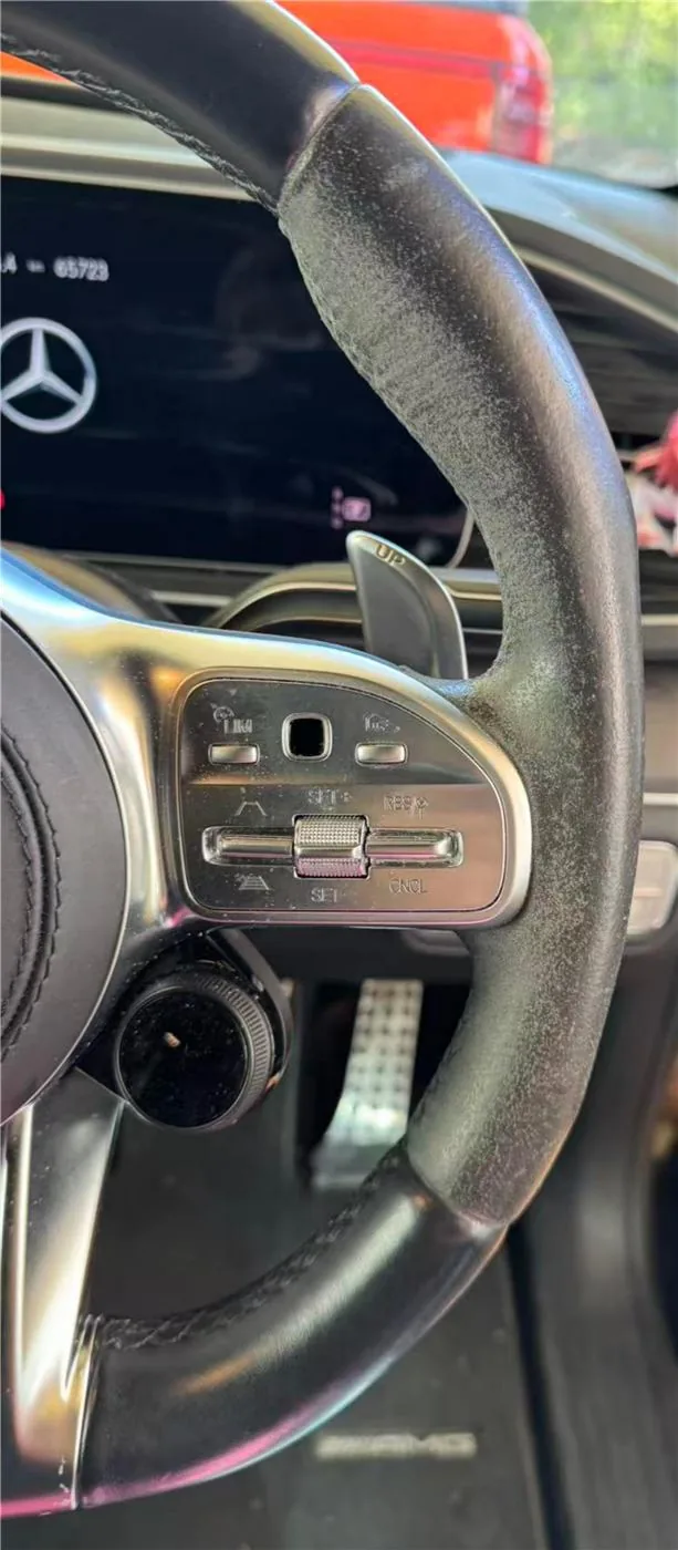 Before: GLS63 AMG Steering Wheel Alcantara Restoration