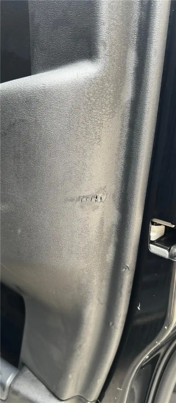 Before: Land Rover Driver's Door Trim Scratch Repair