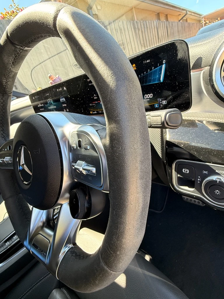 Before: Mercedes-Benz AMG CLA 45S Alcantara Steering Wheel Restoration