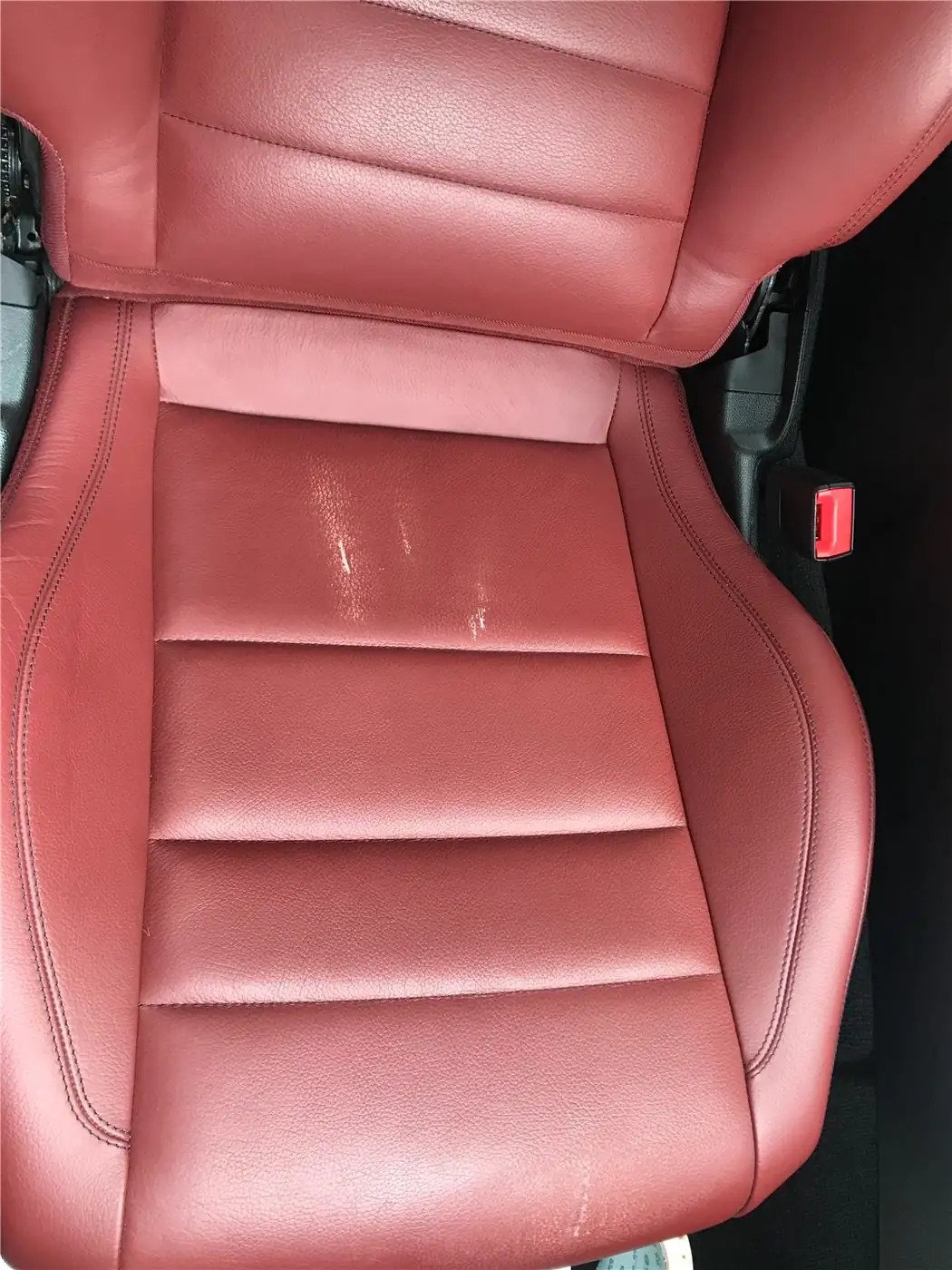Before: Mercedes-Benz C207 Seat Cushion Scratch Restoration